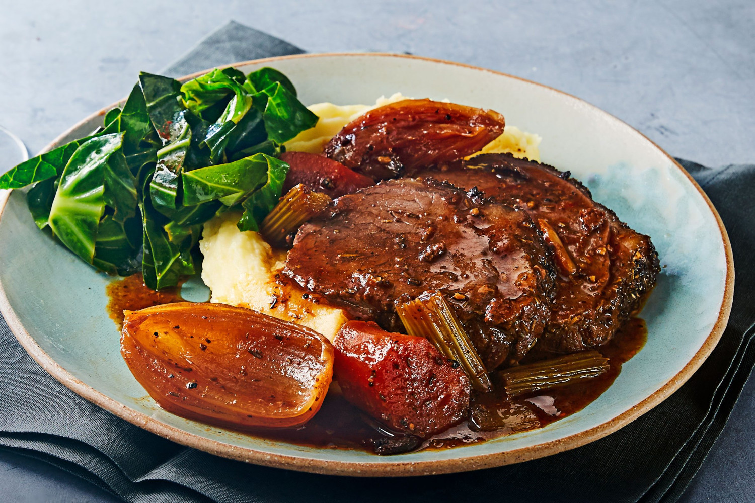 BEEF STEAK ( 250g).  ( well marinated topside beef, Pan-seared with butter on a bed of