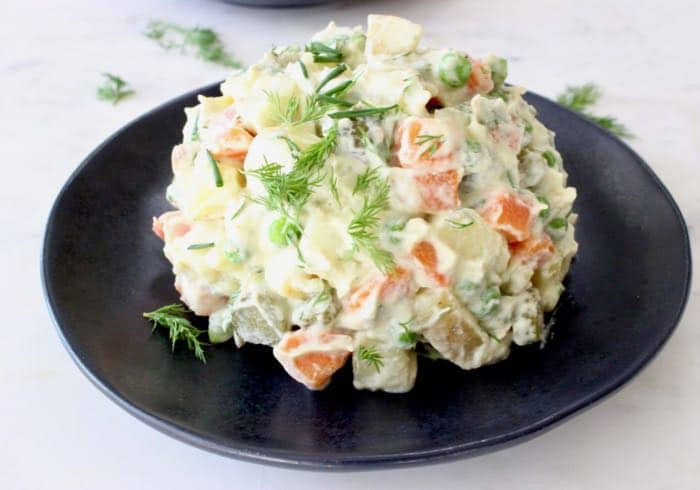 RUSSIAN SALAD. ( potatoes, harm , green peas, egg) Carrots, onions, olive oil, parsley Salad dressing