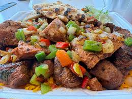 HOT PAN PLATTER. ( beef steak , chicken steak) Lamb chops served with tossed veggie
