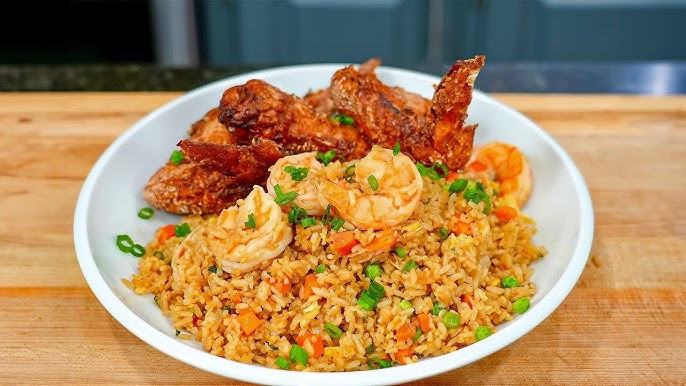 Fried rice/ Jollof with chicken wings