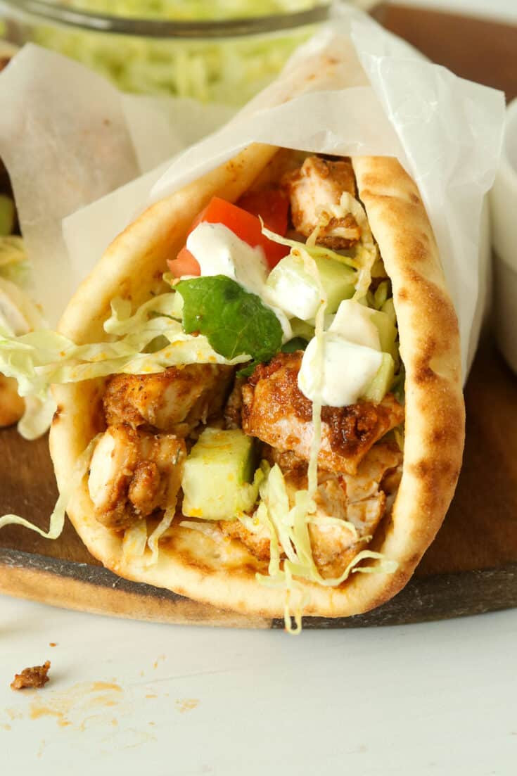 CHICKEN 75gh ( shredded chicken, onions, lettuce) Cucumber, tomato, shawarma sauce Grated beetroot